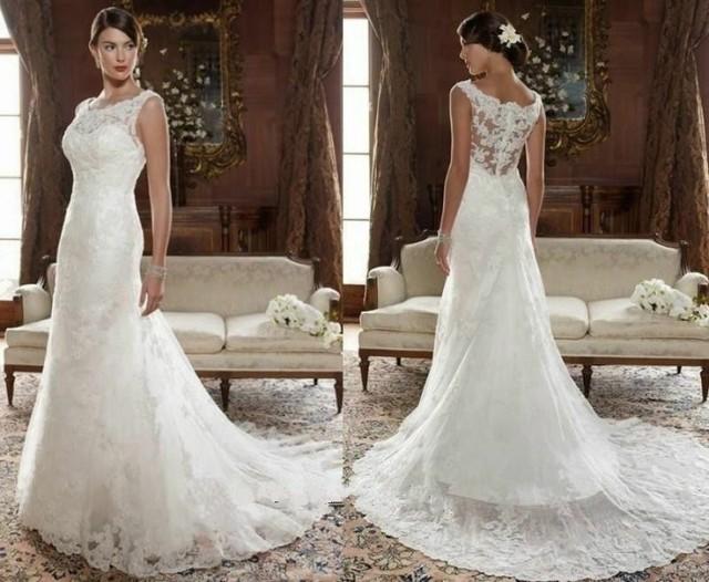 wedding photo - Sleeveless white wedding dress with floral laces