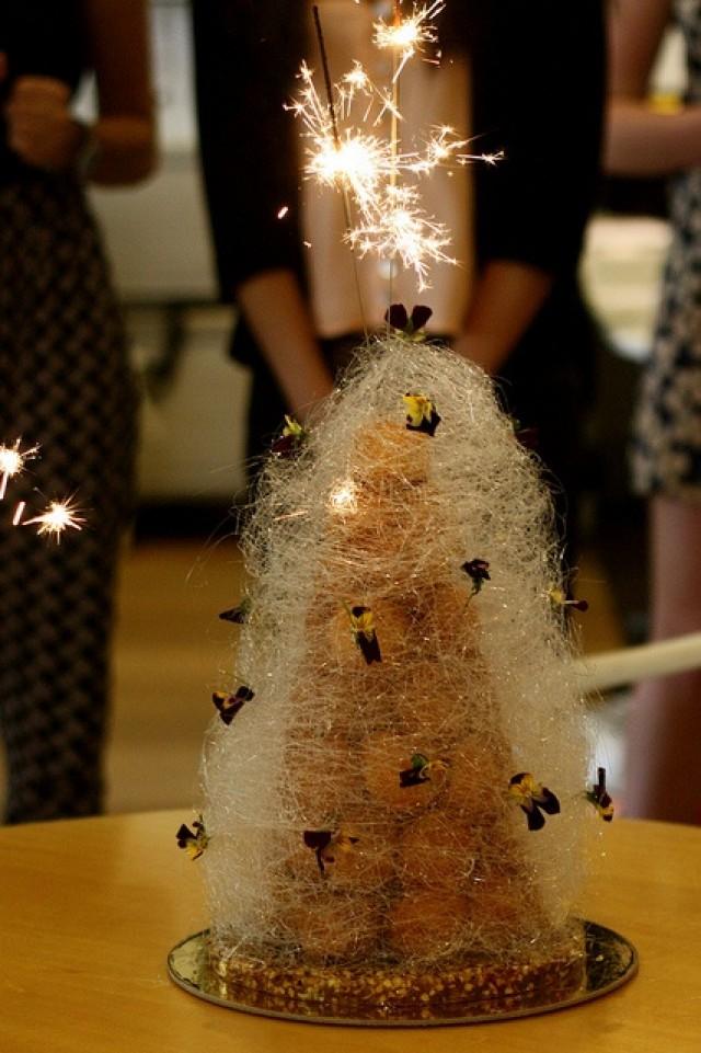 wedding photo - Croquembouche coated with Sugar Syrup and the cracker on the top.