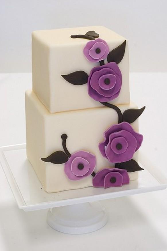 wedding photo - White Fondant Special Wedding Cake With Purple Flowers 