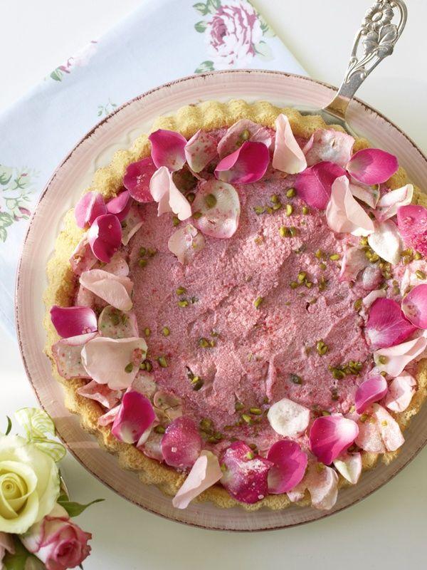 Wedding - Light pink raspberry wedding cake decorated with rose petals