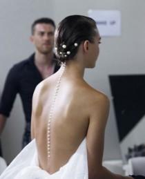wedding photo - A Line Of Pearls Down The Back At Chanel 