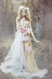 wedding photo - A woman wearing flowers as a accessory.